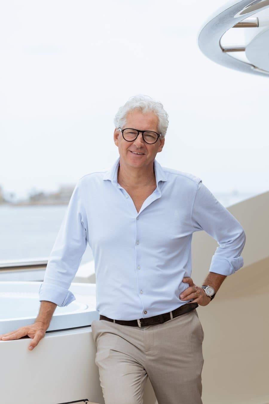 Jan-Jaap Minnema, Sales Broker at Fraser Yachts Monaco, smiling on the deck of a yacht